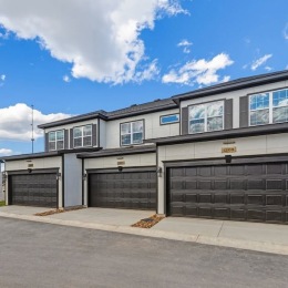 a house with windows and garages