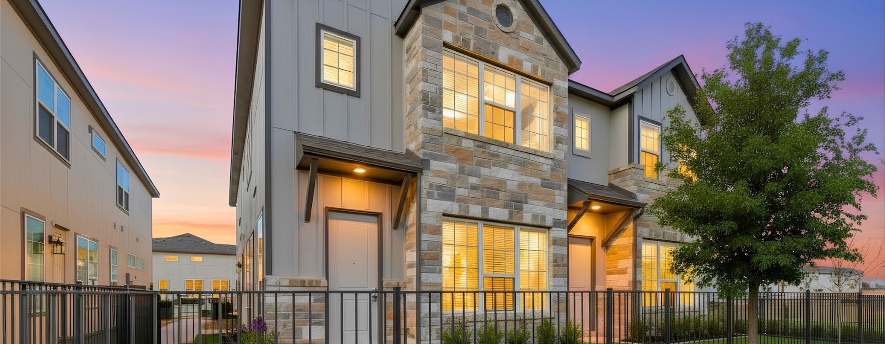 a house with windows and a tree